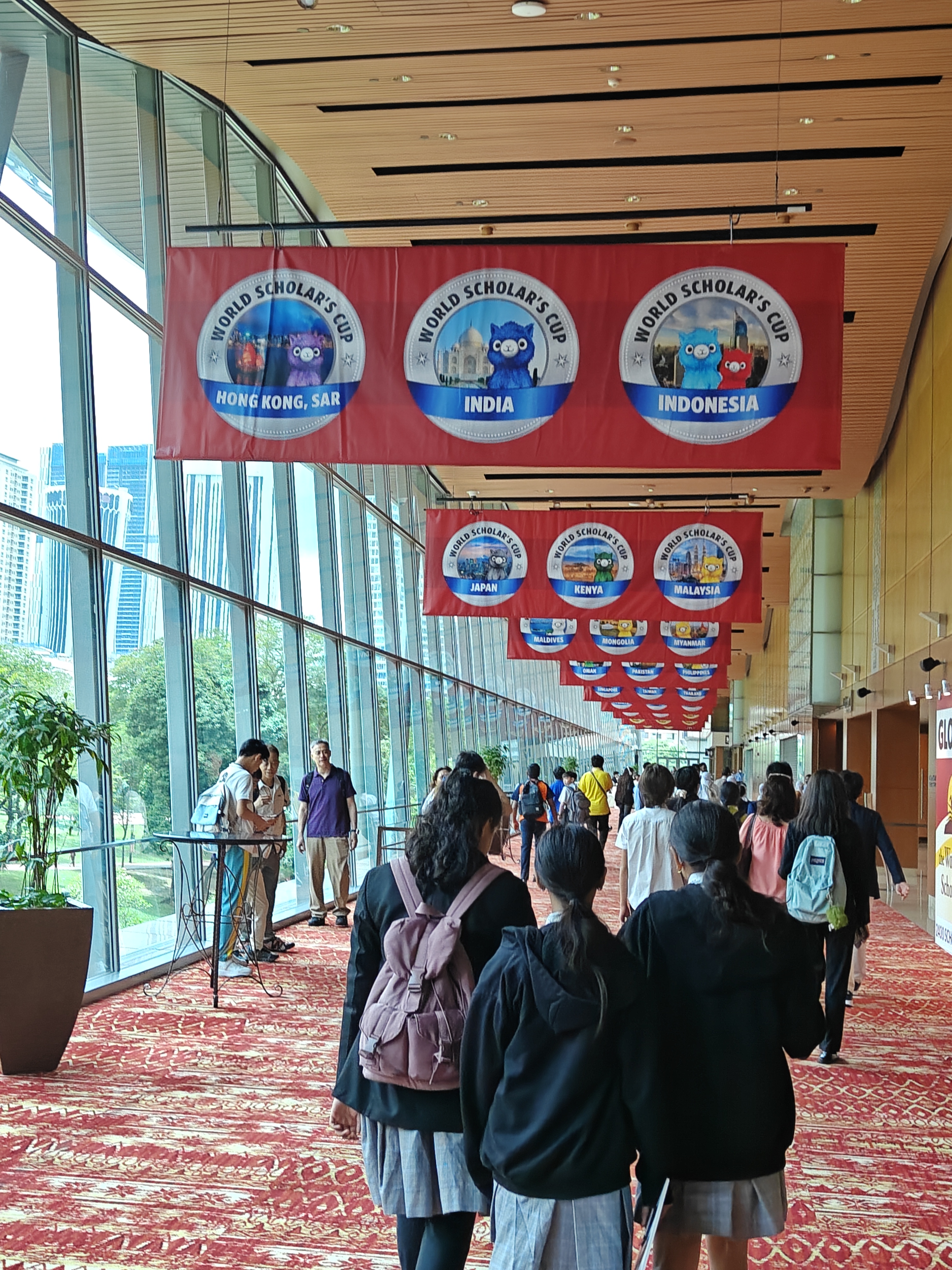 WSC India banner — students walk in